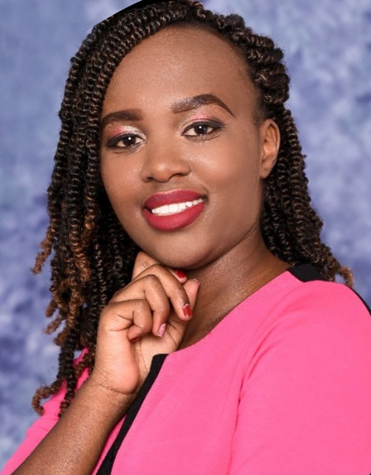 Women looking towards camera, she has on a pink dress